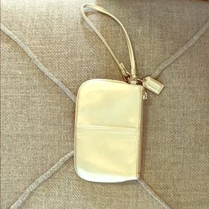 Silver coach wristlet.